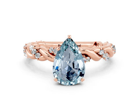 Rose gold Pear Cut Aquamarine Solitaire Ring with Twisted Band and Pavé Accents