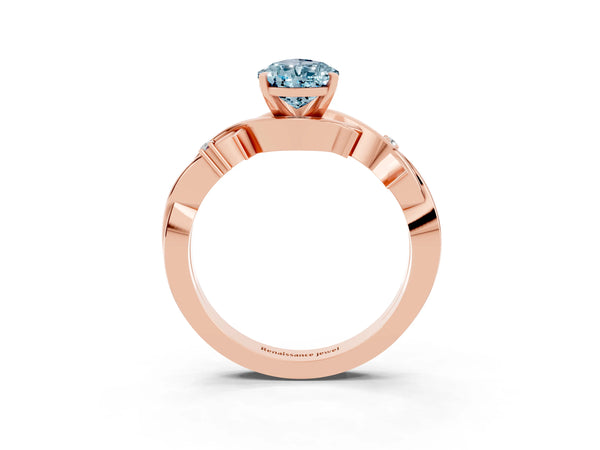 Rose gold Pear Cut Aquamarine Solitaire Ring with Twisted Band and Prong Setting