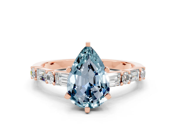 Rose gold Pear Cut Aquamarine Solitaire with Side Baguettes and Channel Set Band