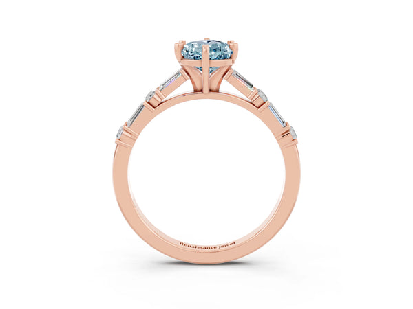 Rose gold Pear Cut Aquamarine Solitaire with Side Baguettes and Channel Set Band