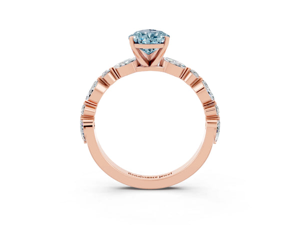 Rose gold Pear Cut Aquamarine Ring with Marquise and Round  Side Stones and Four-Prong Setting