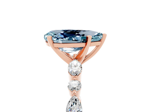 Rose gold Pear Cut Aquamarine Solitaire with Side Stones on a Pavé Band and Four-Prong Setting_5