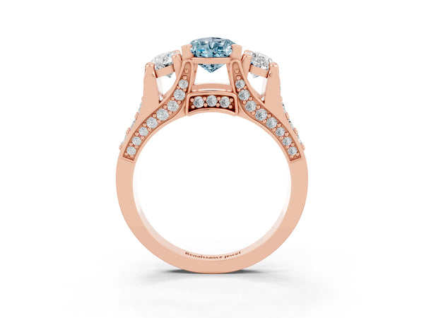 Rose gold Pear Cut Aquamarine Three-Stone Ring with Channel Set Band and Four-Prong Setting