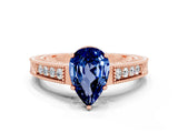 Rose gold Pear Cut Blue Sapphire Engagement Ring with Milgrain Channel Set Band and Prong Setting