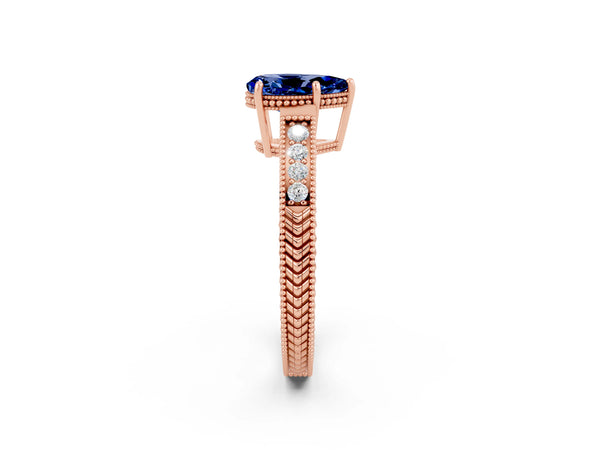 Rose gold Pear Cut Blue Sapphire Engagement Ring with Milgrain Channel Set Band and Prong Setting