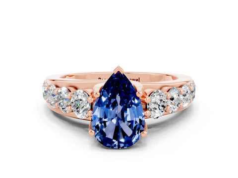 Rose gold Pear Cut Blue Sapphire Engagement Ring with Pavé Band and Four-Prong Setting
