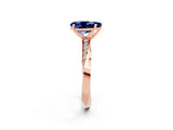 Rose gold Pear Cut Blue Sapphire Engagement Ring with Side Stone Accents and Four-Prong Setting_62