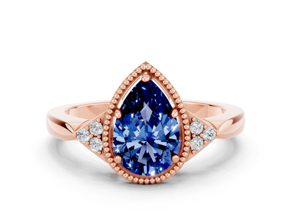 Rose gold Pear Cut Blue Sapphire Halo Ring with Tapered Band and Four-Prong Setting