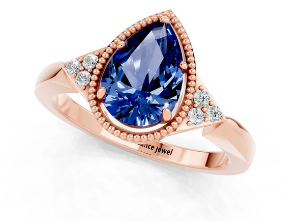 Rose gold Pear Cut Blue Sapphire Halo Ring with Tapered Band and Four-Prong Setting