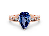 Rose gold Pear Cut Blue Sapphire Milgrain Pavé Engagement Ring with Four-Prong Setting