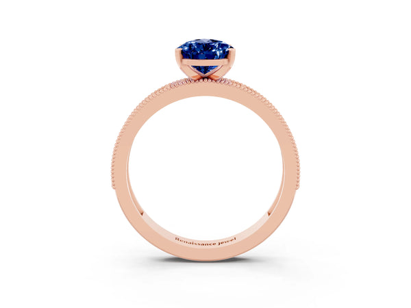 Rose gold Pear Cut Blue Sapphire Milgrain Pavé Engagement Ring with Four-Prong Setting