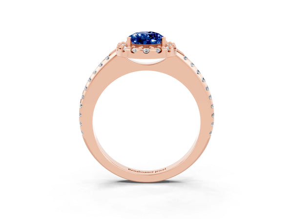 Rose gold Pear Cut Blue Sapphire Pavé Halo Ring with Four-Prong Setting