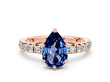 Rose gold Pear Cut Blue Sapphire Pavé Solitaire Ring with Round Band and Prong Setting_24