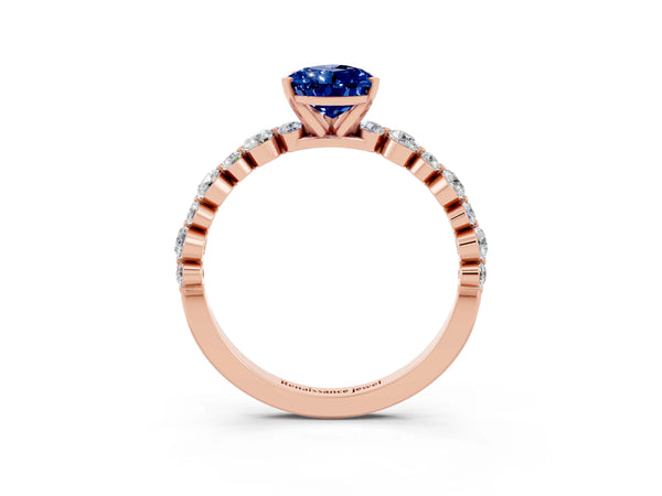 Rose gold Pear Cut Blue Sapphire Prong Set Engagement Ring with Pavé Band