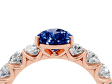 Rose gold Pear Cut Blue Sapphire Prong Setting with Side Stones on a Pave Band_4