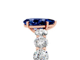 Rose gold Pear Cut Blue Sapphire Prong Setting with Side Stones on a Pave Band_5