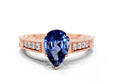 Rose gold Pear Cut Blue Sapphire Ring with Milgrain Pavé Band and Four-Prong Setting_12