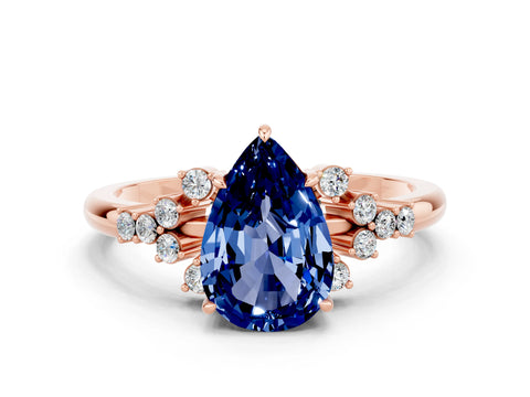 Rose gold Pear Cut Blue Sapphire Ring with Side Stones and Four-Prong Setting_36