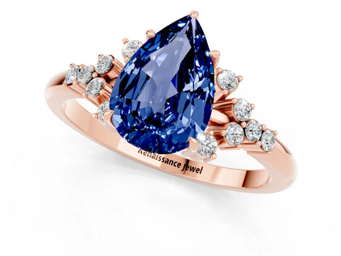 Rose gold Pear Cut Blue Sapphire Ring with Side Stones and Four-Prong Setting_37