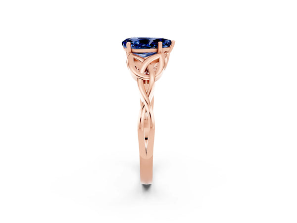 Rose gold Pear Cut Blue Sapphire Solitaire Celtic Knot Ring with Four-Prong Setting