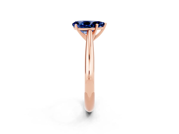 Rose gold Pear Cut Blue Sapphire Solitaire Engagement Ring with Cathedral Setting and Four-Prong Mount