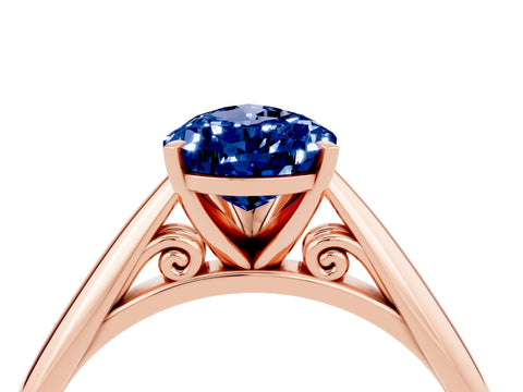 Rose gold Pear Cut Blue Sapphire Solitaire Engagement Ring with Cathedral Setting and Four-Prong Mount_16