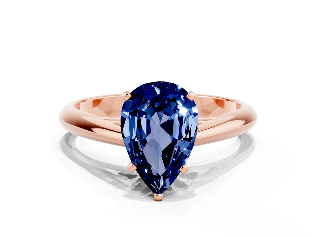 Rose gold Pear Cut Blue Sapphire Solitaire Engagement Ring with Cathedral Setting and Four-Prong Mount_66