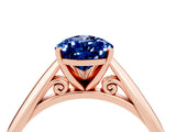 Rose gold Pear Cut Blue Sapphire Solitaire Engagement Ring with Cathedral Setting and Four-Prong Mount_70