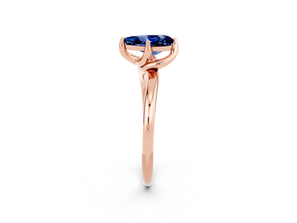 Rose gold Pear Cut Blue Sapphire Solitaire Engagement Ring with Four-Prong Setting and Classic Band
