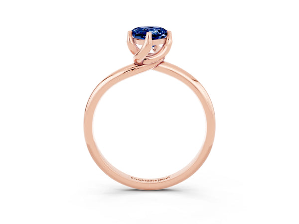 Rose gold Pear Cut Blue Sapphire Solitaire Engagement Ring with Four-Prong Setting and Classic Band