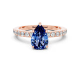 Rose gold Pear Cut Blue Sapphire Solitaire Engagement Ring with Pavé Band and Four-Prong Setting