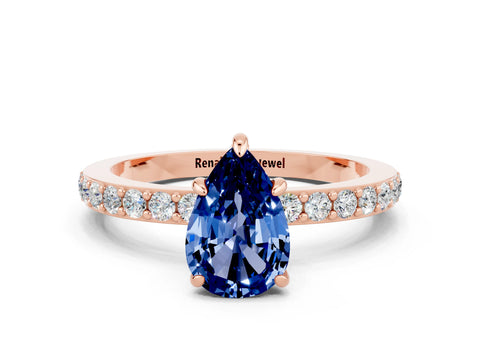 Rose gold Pear Cut Blue Sapphire Solitaire Engagement Ring with Pavé Band and Four-Prong Setting