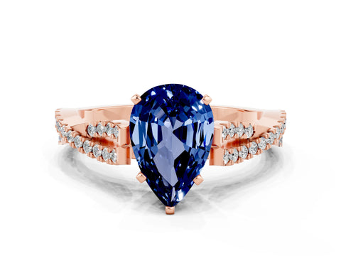 Rose gold Pear Cut Blue Sapphire Solitaire Engagement Ring with Twisted Pavé Band and Four-Prong Setting