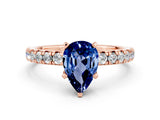 Rose gold Pear Cut Blue Sapphire Solitaire Pavé Engagement Ring with Round Band and Prong Setting_78