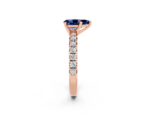 Rose gold Pear Cut Blue Sapphire Solitaire Pavé Engagement Ring with Round Band and Prong Setting