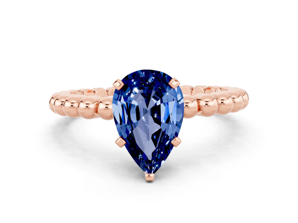 Rose gold Pear Cut Blue Sapphire Solitaire Ring with Beaded Band and Prong Setting