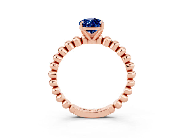 Rose gold Pear Cut Blue Sapphire Solitaire Ring with Beaded Band and Prong Setting