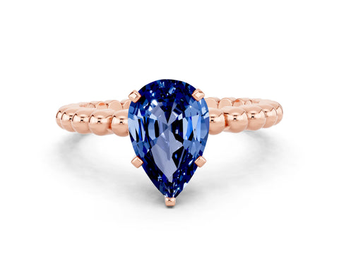 Rose gold Pear Cut Blue Sapphire Solitaire Ring with Beaded Band and Prong Setting