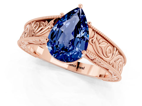 Rose gold Pear Cut Blue Sapphire Solitaire Ring with Engraved Band and Four-Prong Setting_1