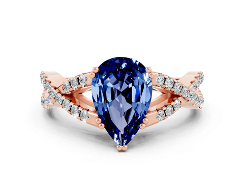 Rose gold Pear Cut Blue Sapphire Solitaire Ring with Four-Prong Setting and Twisted Pavé Band