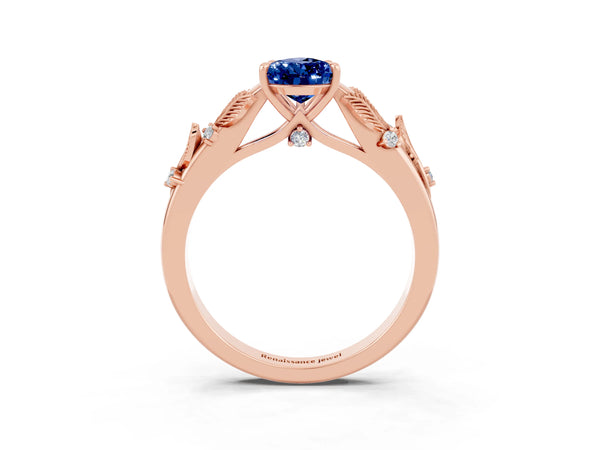 Rose gold Pear Cut Blue Sapphire Solitaire Ring with Leaf Motif Band and Four-Prong Setting