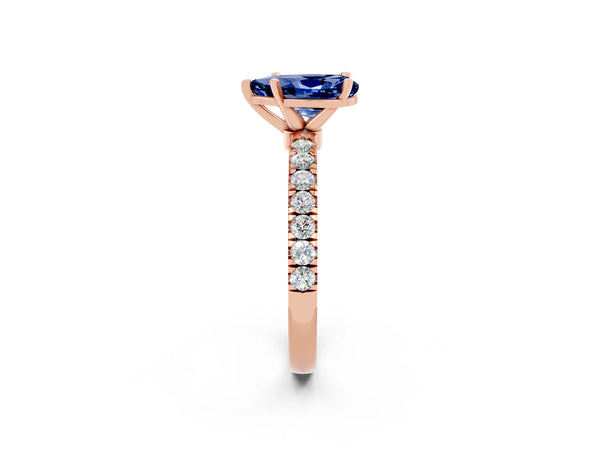 Rose gold Pear Cut Blue Sapphire Solitaire Ring with Pavé Accents and Four-Prong Setting