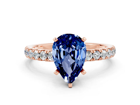 Rose gold Pear Cut Blue Sapphire Solitaire Ring with Pavé Accents and Four-Prong Setting