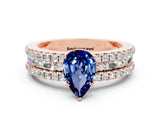 Rose gold Pear Cut Blue Sapphire Solitaire Ring with Pavé and Channel Set Band