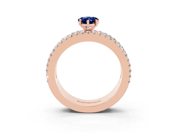 Rose gold Pear Cut Blue Sapphire Solitaire Ring with Pavé and Channel Set Band