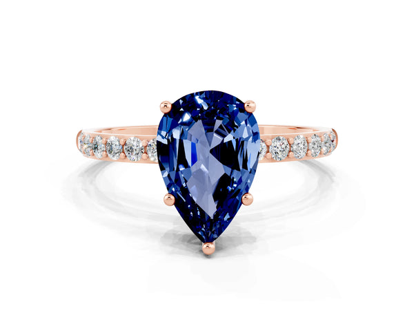 Rose gold Pear Cut Blue Sapphire Solitaire Ring with Round  Pavé Band and Prong Setting