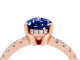 Rose gold Pear Cut Blue Sapphire Solitaire Ring with Round  Pavé Band and Four-Prong Setting_60