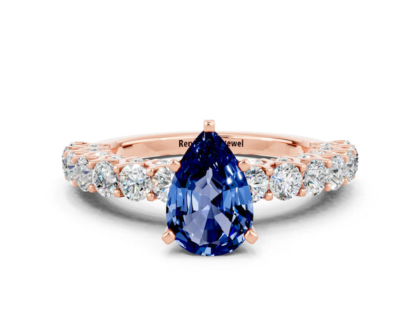 Rose gold Pear Cut Blue Sapphire Solitaire Ring with Shared Prong Pavé Band and Four-Prong Setting