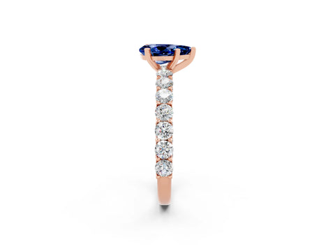 Rose gold Pear Cut Blue Sapphire Solitaire Ring with Shared Prong Pavé Band and Four-Prong Setting_2