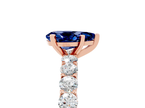 Rose gold Pear Cut Blue Sapphire Solitaire Ring with Shared Prong Pavé Band and Four-Prong Setting_5